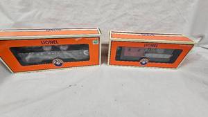 Lionel Gondola wcanisters and Work Caboose