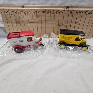 Lot of 2 Delivery Truck Coin Banks with advertising
