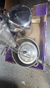 Stainless and aluminum pots, colander