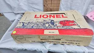 Box with Lionel Train Cars and Accessories as Shown