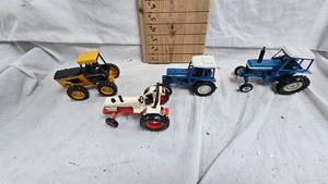 132 2 Ford Tractors, 1 Case, and 1 Versatile