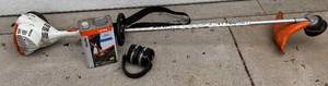 Stihl FS 56RC Gas Powered Weed Trimmer with 501 Engineered FuelOil Mix and Cabelas Ear Protection