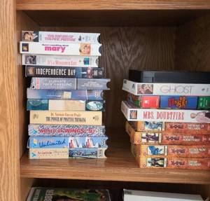 Mixed VHS Tape Lot Movies Anime Aviation Oshkosh Yu-Gi-Oh Titles and with a vintage Orion Automatic VHS Rewinder RW1300