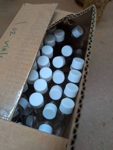 Uline S-21128 1 oz Clear Cylinder Bottles w Standard Caps Box