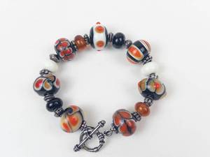 Sterling Silver Orange & Black Glass Bead Bracelet