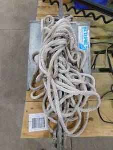 Waterspike boat anchor with rope.