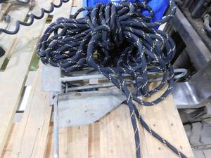 Waterspike boat anchor with rope.