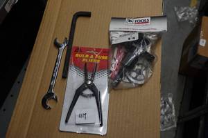 Wrench, Bulb & Fuse Pliers and Volkswagen Brake Caliper