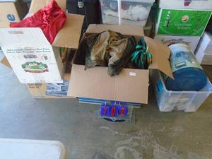 Boxes of clothes. As shown. CASH ON SITE ONLY. PICKUP IS TUESDAY MAY 26TH FROM 11 AM TO 4 PM ONLY. THERE IS NO OTHER OPPORTUNITY TO PICK UP YOUR TIEM THAN THIS TIME & REGARDLESS WHAT THE SCHEDULE STATES.