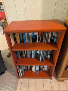 Wooden Bookcase With Assorted Hardcover Books