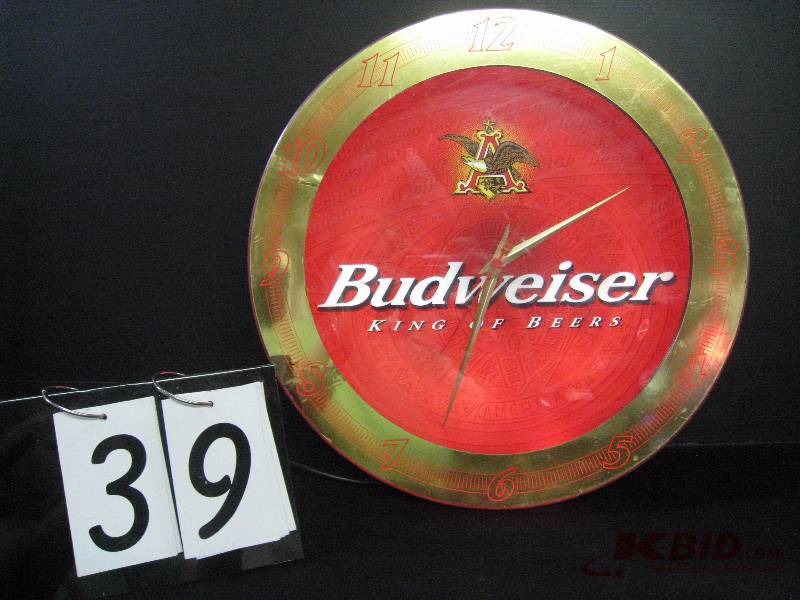 lot 39 image: Budweiser clock backlit with ruby neon tube, 120 V neon, battery operated clock 18 diam