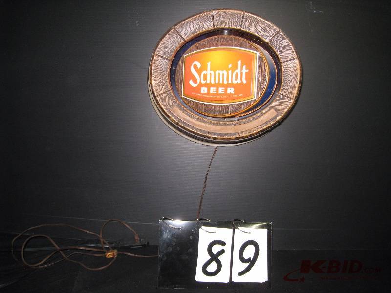 lot 89 image: Schmidt barrel , RARE, rotating logo  beer glass, vaccuum formed plastic display - Great Condition 15 w x 12 h x 8 deep
