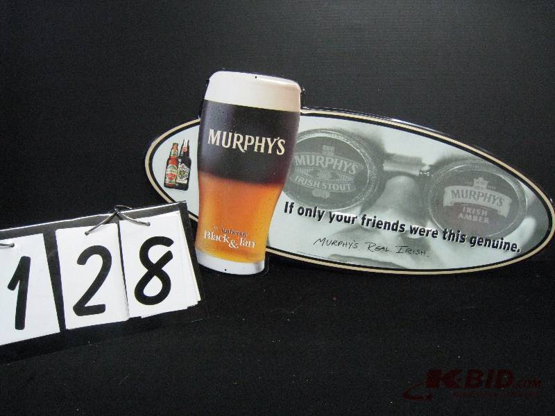 lot 128 image: Murphys Black & Tan - Nice new tin tacker 27 w x 13 h