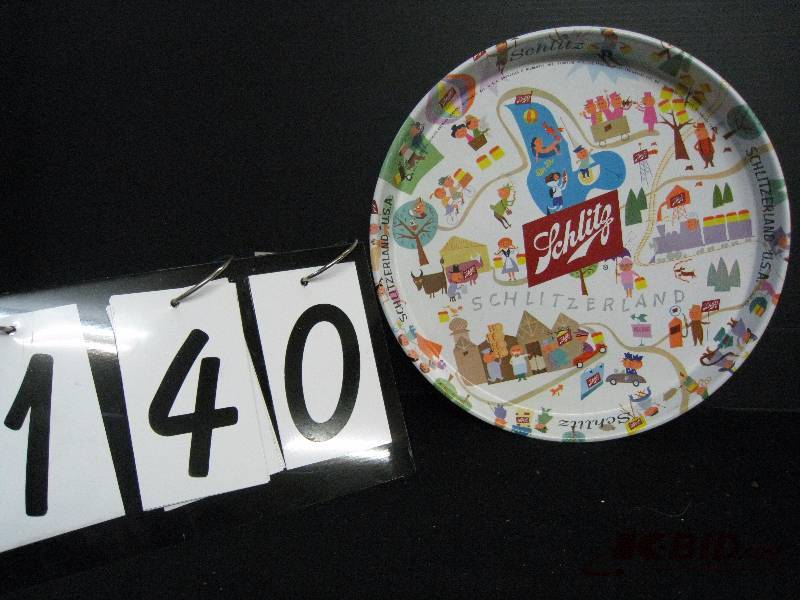 lot 140 image: Schlitz - Schlitzerland retro graphics serving tray 12 diam.