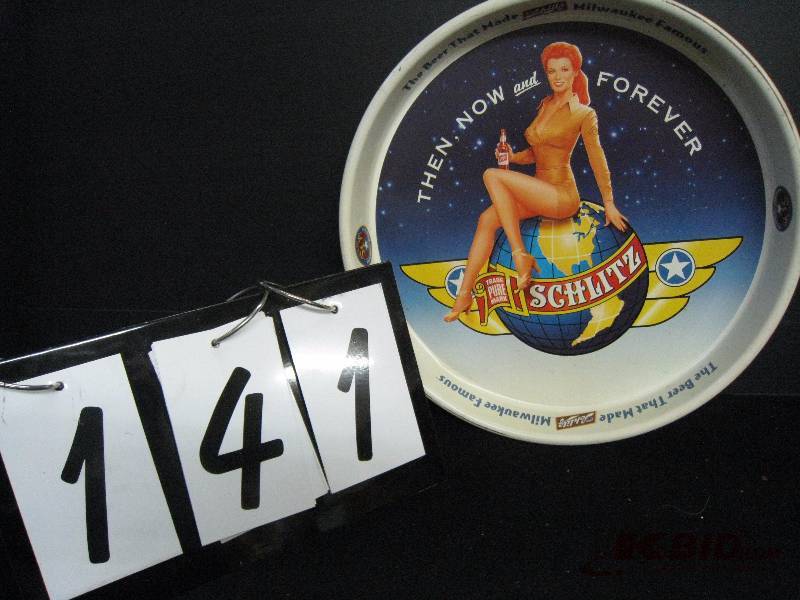 lot 141 image: Schlitz - Girl on Globe 50th Anniversary tray, very nice 13 diam.