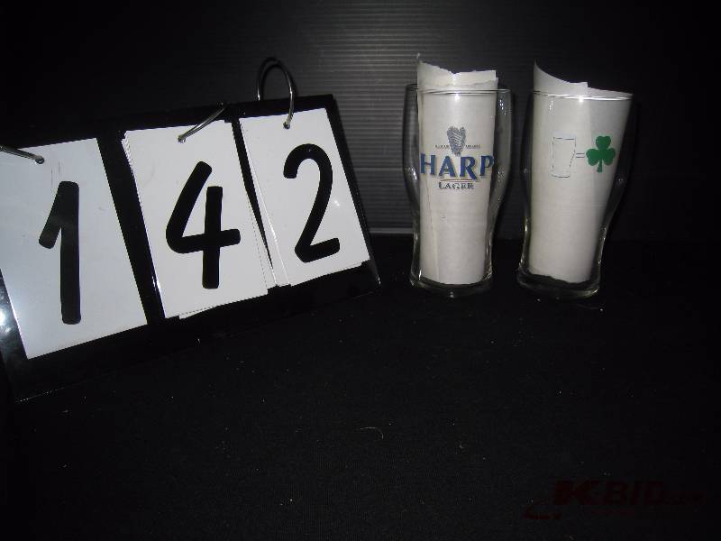 lot 142 image: Case of 22 Harps Beer glasses, 16 oz - photo shows two sides of one glass