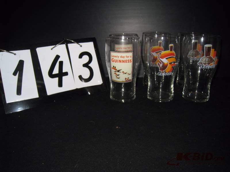 lot 143 image: 6 Guinness 16 oz glasses, 3 pairs, different characters