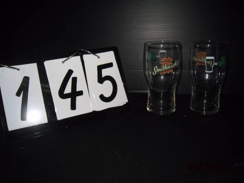lot 145 image: Smithwicks logo, 16 oz glasses - qty 14, photo shows both sides of one glass