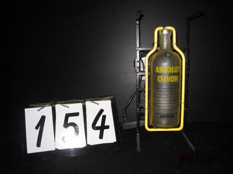 lot 154 image: Absolut Citron Vodka bottle w neon - rare 7 w x 15 h