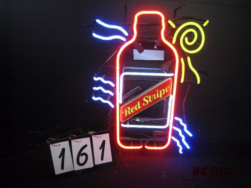 lot 161 image: Red Stripe oasis theme - nice neon sign 20 w x 26 h