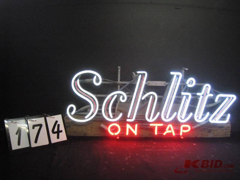 lot 174 image: Schlitz on Tap - rare vintage switcher neon sign, still in box 34 w x 14 h