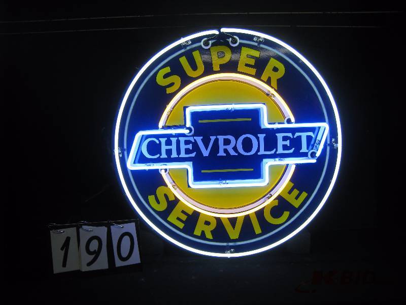 lot 190 image: Chevorlet Super Service neon on porcelain sign face, new neon and sign can 30 diam.