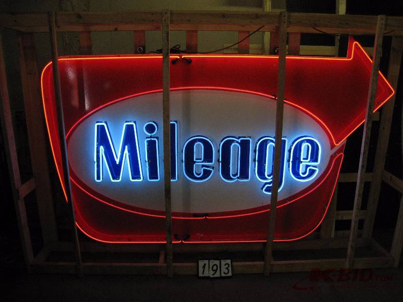 lot 193 image: Mileage porcelain neon sign, sister brand to Western Gas, hangs from chains 108 w x 68 h