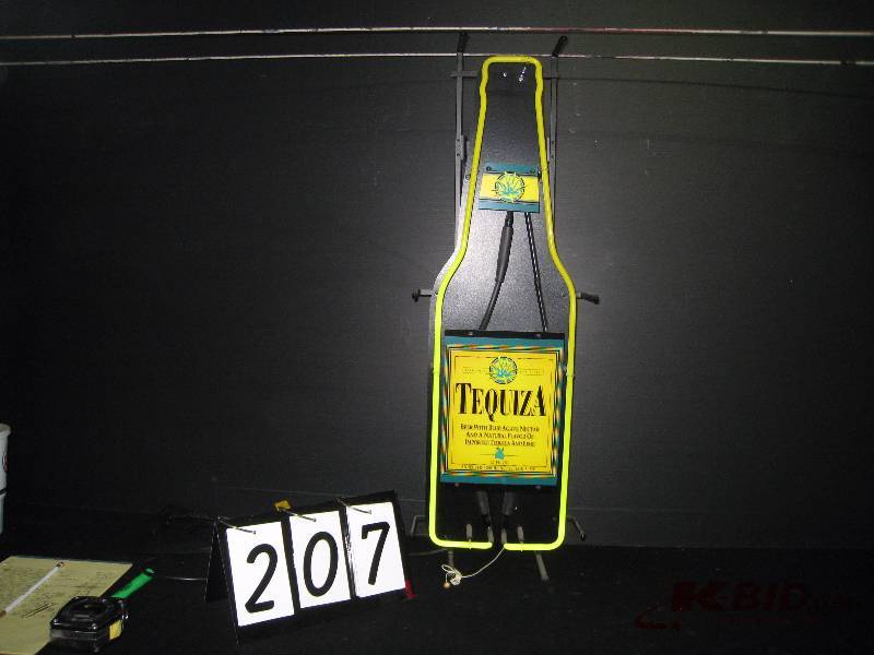 lot 207 image: Tequiza bottle, neon - new in box 11 w x 33 h