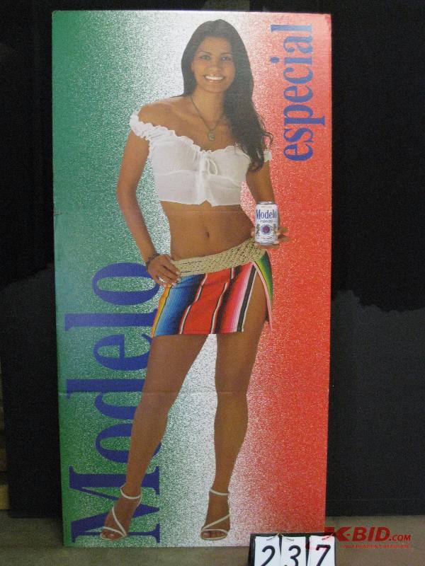 lot 237 image: Modelo Latina cardboard cutout 36 w x 72 h