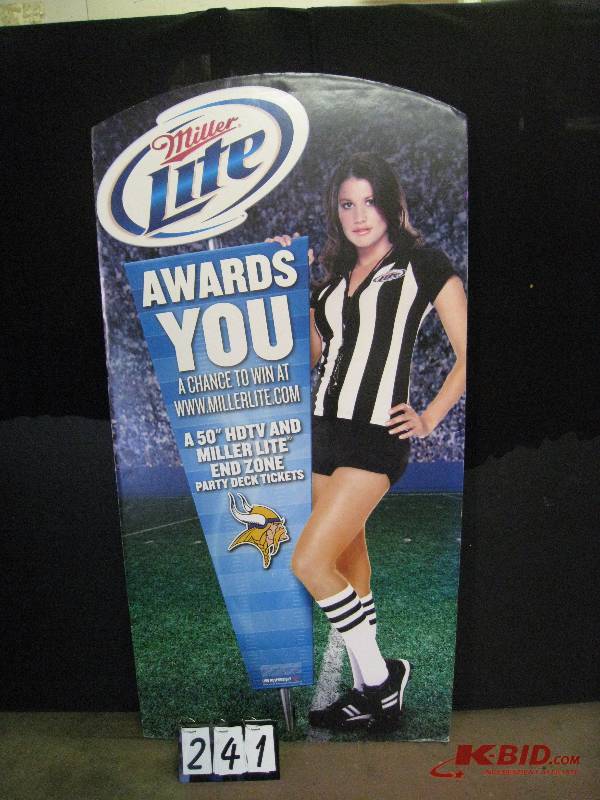 lot 241 image: Miller Lite Vikings Referee Girl foamcore cutout 36 w x 72 h