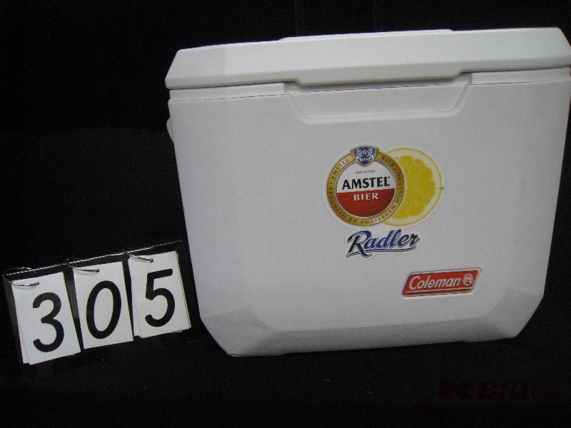 lot 305 image: Amstel Coleman cooler on wheels with telescoping handle, looks new 20 w x 16 h x 18 d
