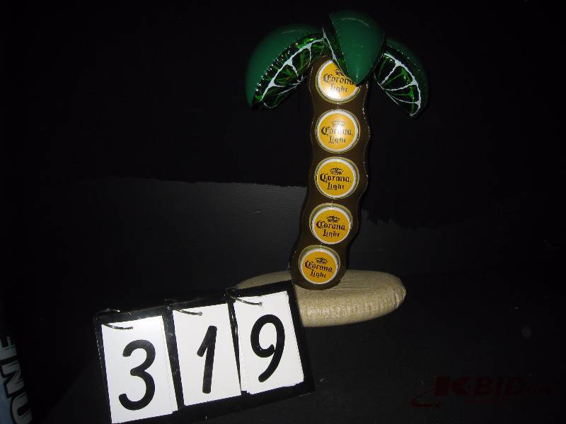 lot 319 image: Corona inflatable palm tree with lime slices as leaves, cute 15 w x 22 h x 12 d