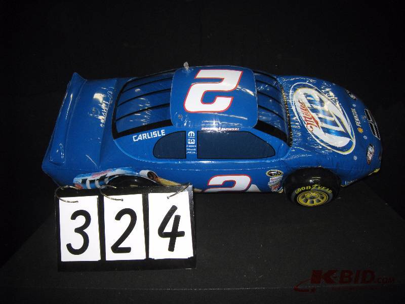lot 324 image: Miller Lite inflatable NASCAR - very cool - clear back window, tires inflate individually 34 w x 16 h x 12 d
