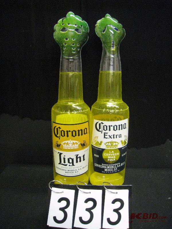 lot 333 image: Corona inflatable bottles with scary face limes Friday 13th Jason Vorhees mask & Scream Ghostface mask. Unique 13 w x 29 h x 7 d