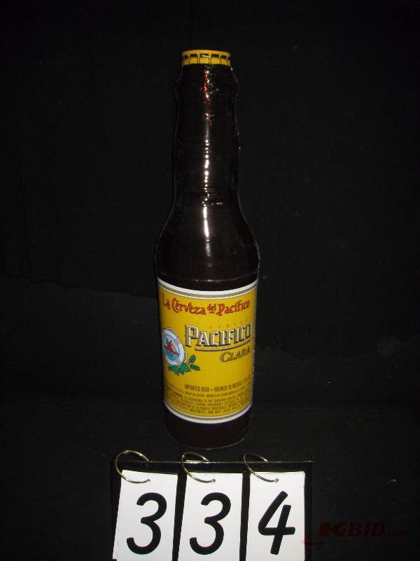 lot 334 image: Pacifico inflatable bottle 7 diam. X 28 h