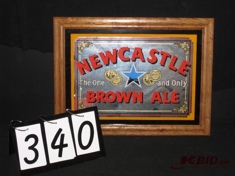 lot 340 image: Newcastle Brown Ale mirror. (white curtain in background reflection of mirror not part of graphics) 21 w x 16 h