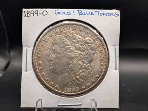 1899-o Morgan Silver Dollar Gold Blue Toning