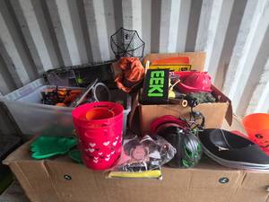 Halloween decoration lot including signs, buckets, hats, and pumpkin decor