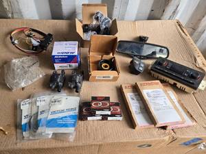 Various Automotive Parts including Including Mirror from 03 Chevy Silverado, Used Ignition Coils, 4x4 Switch, Silverador Front Level Kit and HVAC Control Panel