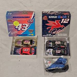 164 Mobil 1 and STP Petty-4 Cars