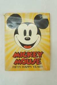 Vintage Walt Disneys Uncle Scrooge in Only A Poor Old Man  from 1952 (published in 1974) Vintage 1977 edition of Mickey Mouse Fifty Happy Years.