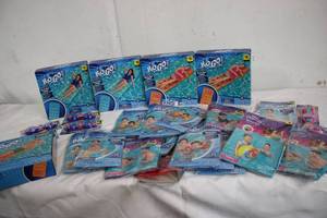 Pool loungers and inflatable arm ba...