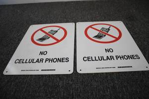 2 NO CELLULAR PHONES signs...