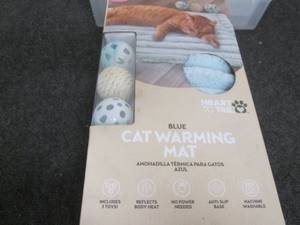 Cat warming mat with toys...