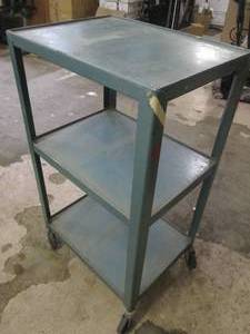 3 Tier metal shelf on wheels...