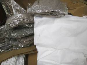Box of king size bedding...