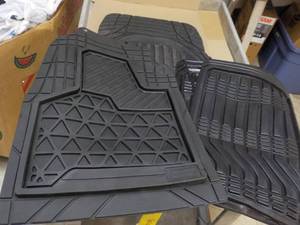 4 Extra Auto Floor Mats...
