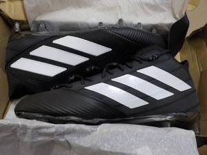 Adidas size 13.5 Football Cleats...