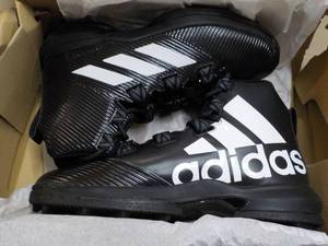 Adidas size 13.5 Football Cleats...