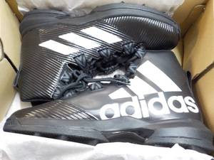 Adidas size 13.5 Football Cleats...